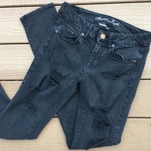 AE Super Stretch Skinny Black Distressed Jeans 4